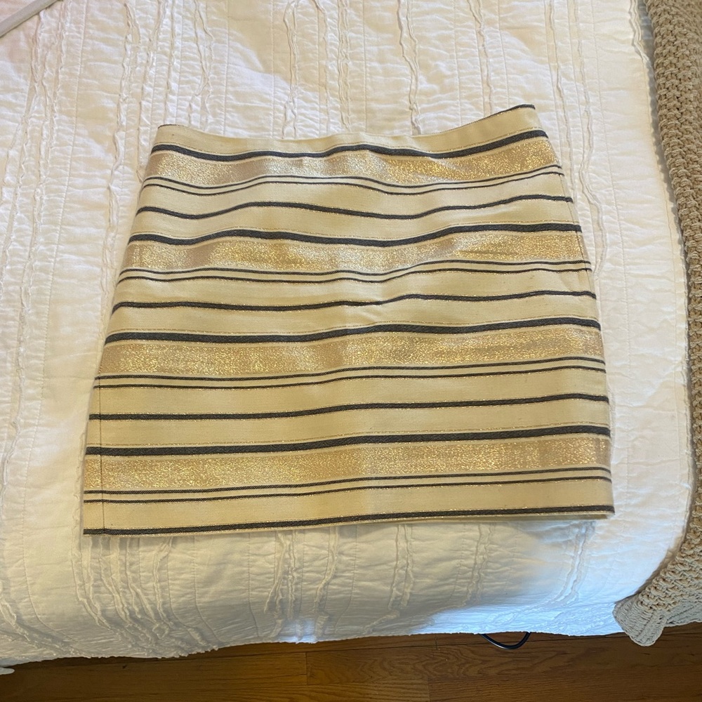 J. crew, size 0, sparkly gold miniskirt.